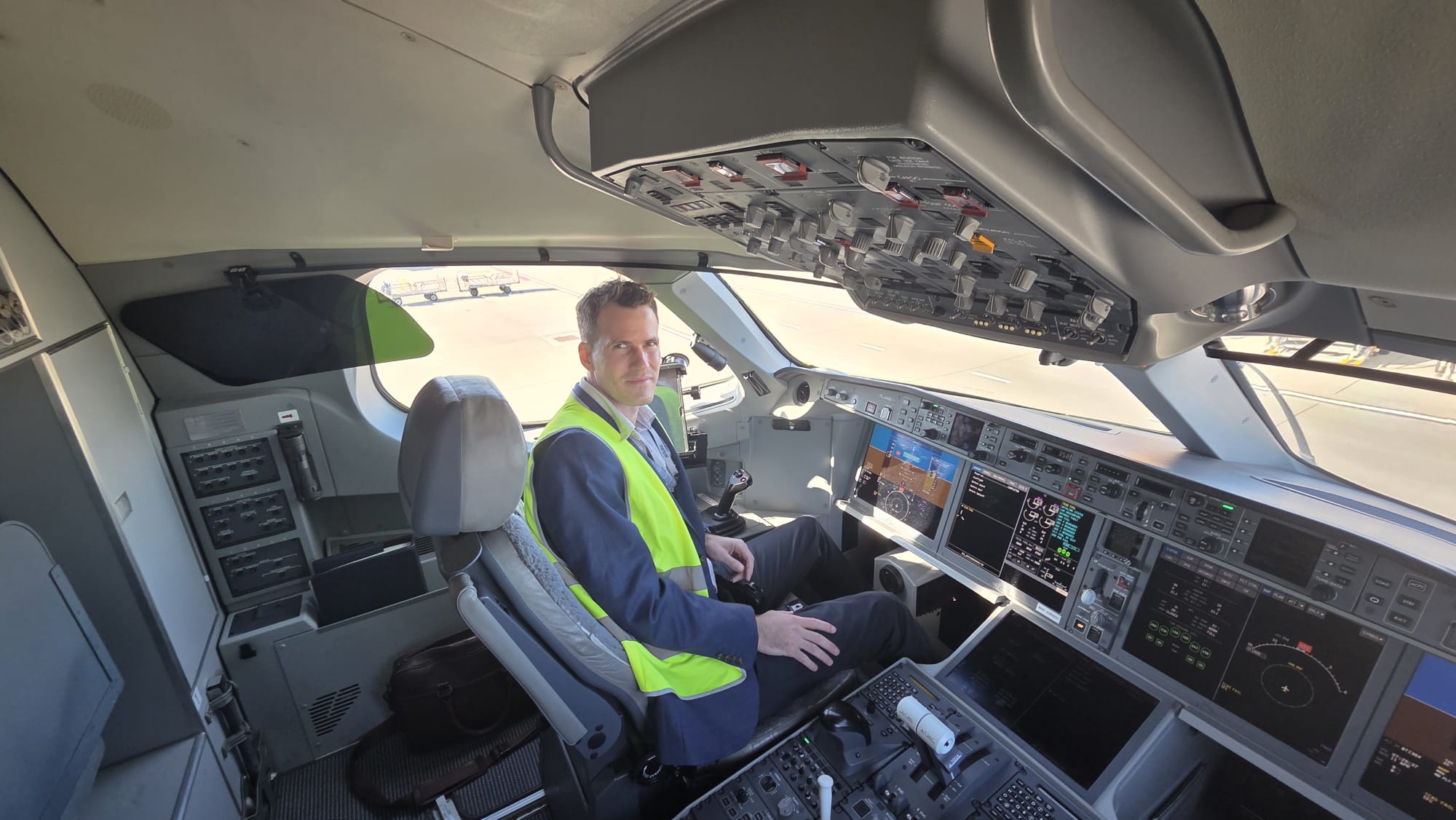 Will Witham in front of an Airbus A220